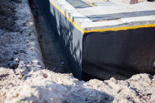 Professional Interior Drainage System technician working in Peru, IL